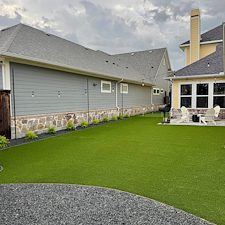 Backyard-Redesign-with-Artificial-Turf-Putting-Green-Landscape-Rock-Installation-in-McKinney-TX 8